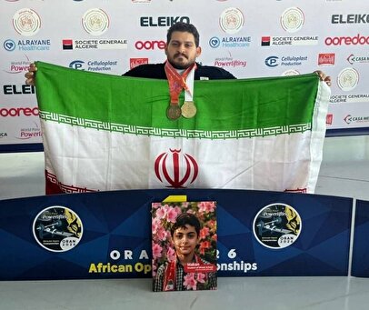 ایزدی مدال‌های طلا و برنز خود را به شهید ماکان نصیری اهدا کرد